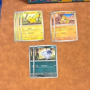 Pokemon 151 Cards - Pikachu, Sandshrew, Nidoran (Yellow, Orange, Blue)